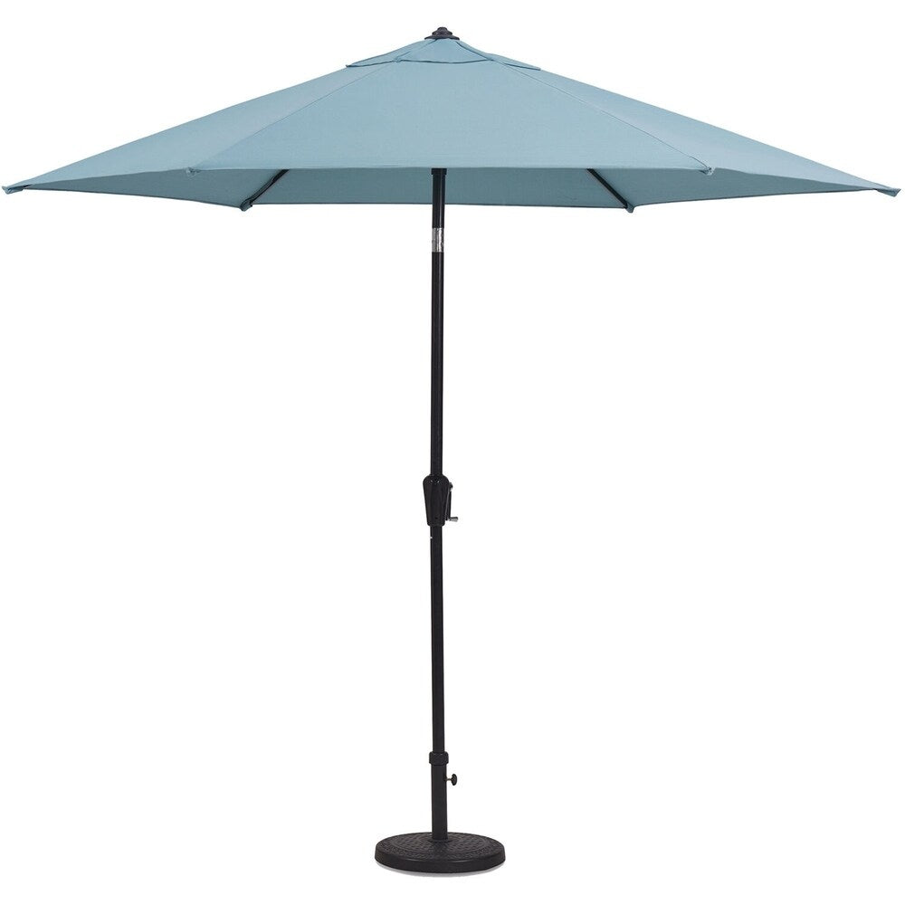 Ensemble de salle à manger Hanover Lavallette 5 pièces bleu océan avec 4 chaises fixes, une table ronde en verre de 132 cm, un parasol et un socle.