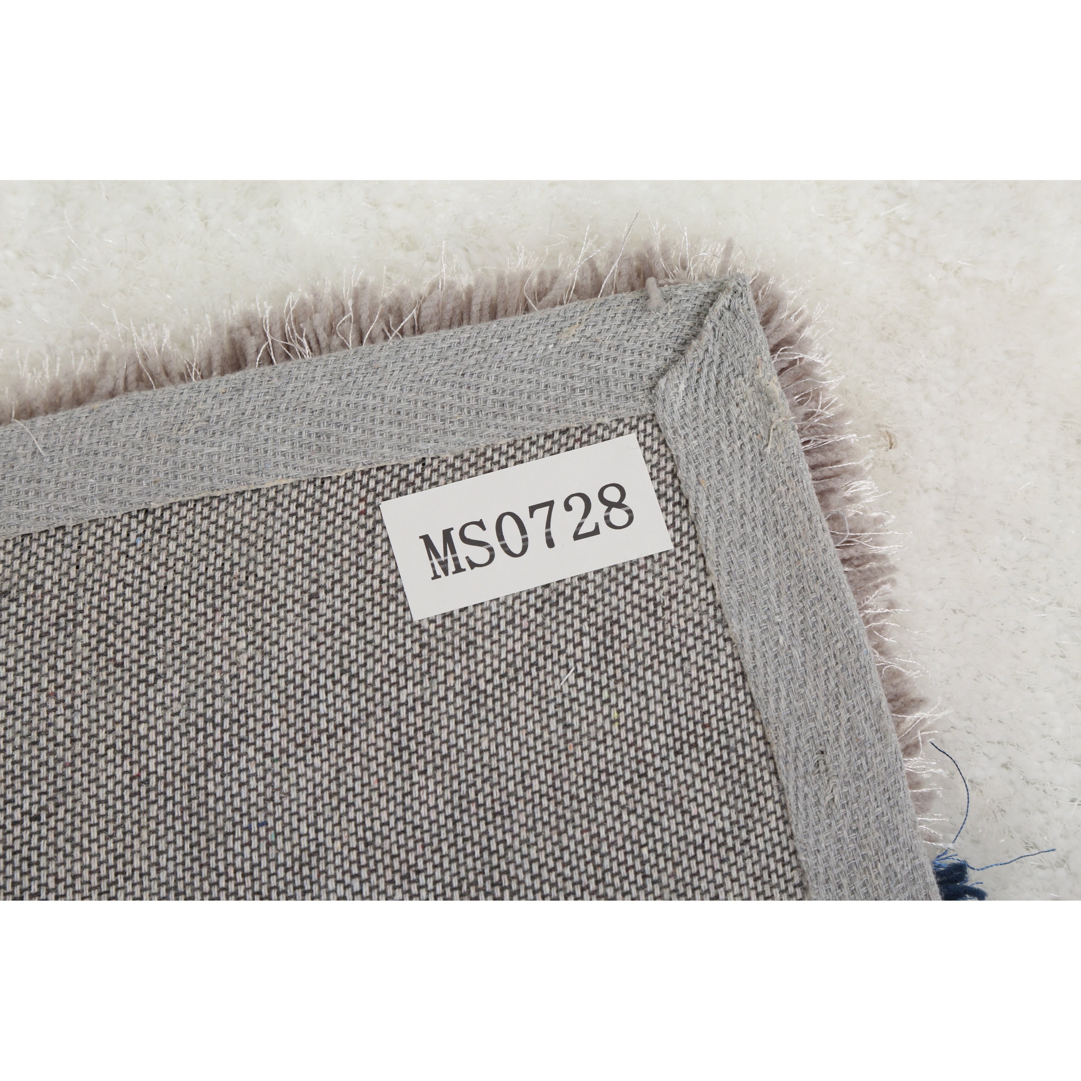 Tapis à poils longs Mateos au design abstrait